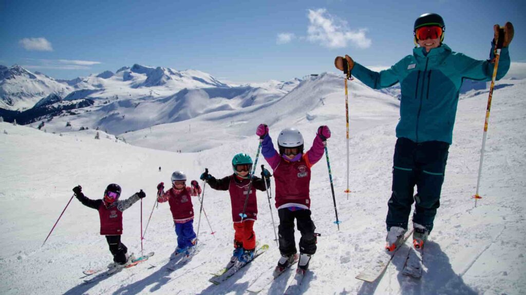 Prj Can Whistler instructor group outstretched 2