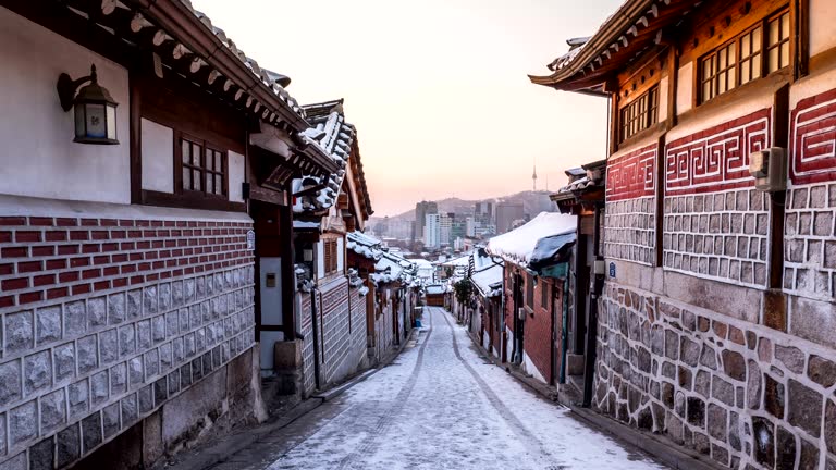 view of bukchon hanok village alley in winter